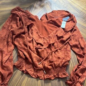 Nwt gorgeous and flattering Anthropologie Terracotta Ruffle Blouse